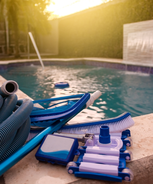A pool with a bunch of blue and white items next to it