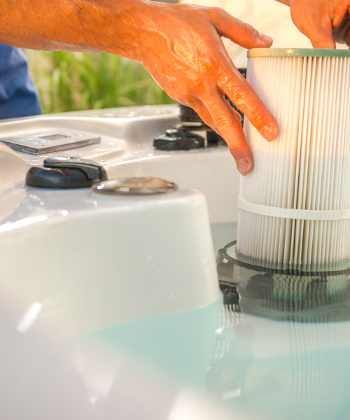 A person is washing a pool with a filter